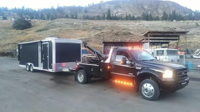 Tow truck in mountain terrain